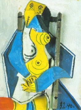 抽象的かつ装飾的 Painting - ファム・アシス・ダン・アン・フォートゥイユ 3 1940 キュビズム